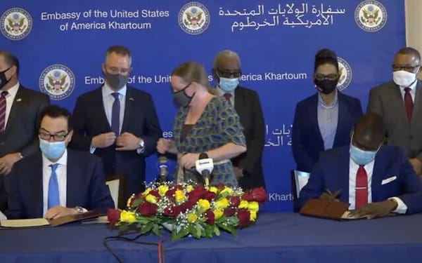 Representatives from the US and Sudanese government sign the final Abraham Accords agreement on Ja(Screen capture: Facebook)